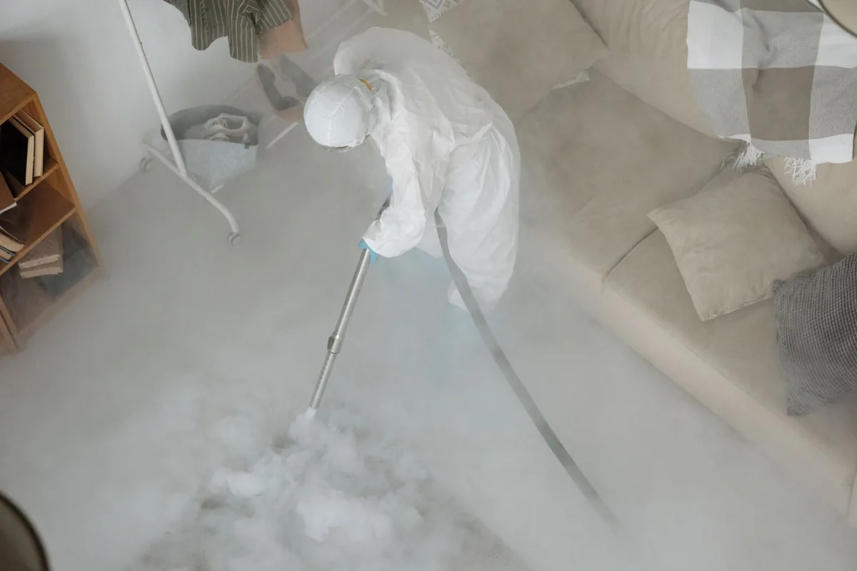 Biohazard cleanup technician in protective equipment, Moxee, WA